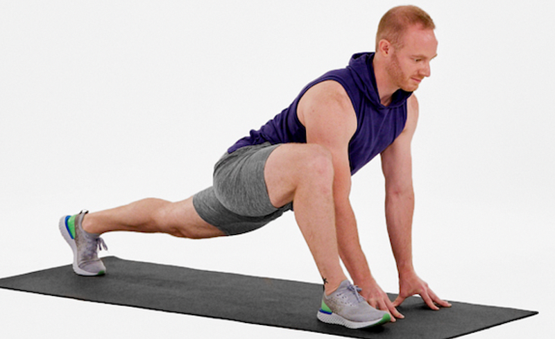 Demonstrating the foot elevated groiner exercise