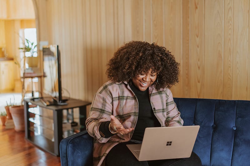 A person seemingly enjoying a tech-filled workspace